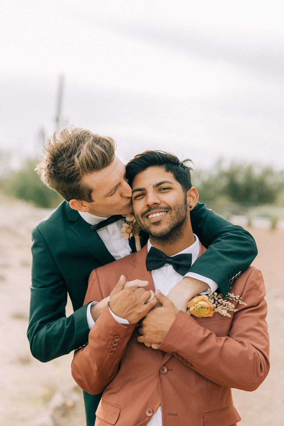 Newlywed Couple Posing for Pictorial Outdoors